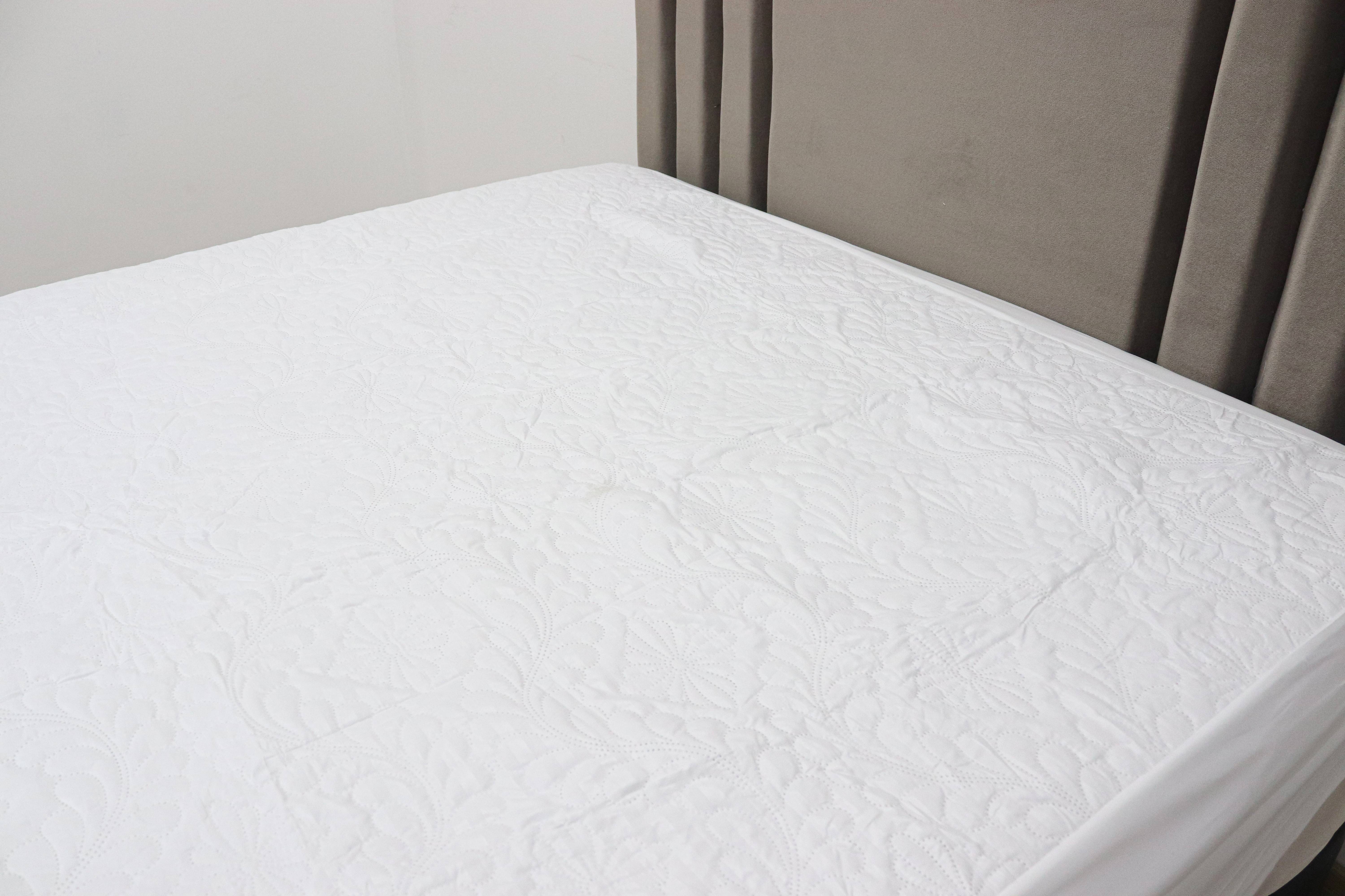 Protector de colchón en tela. sencillo - Hotelero Colombia